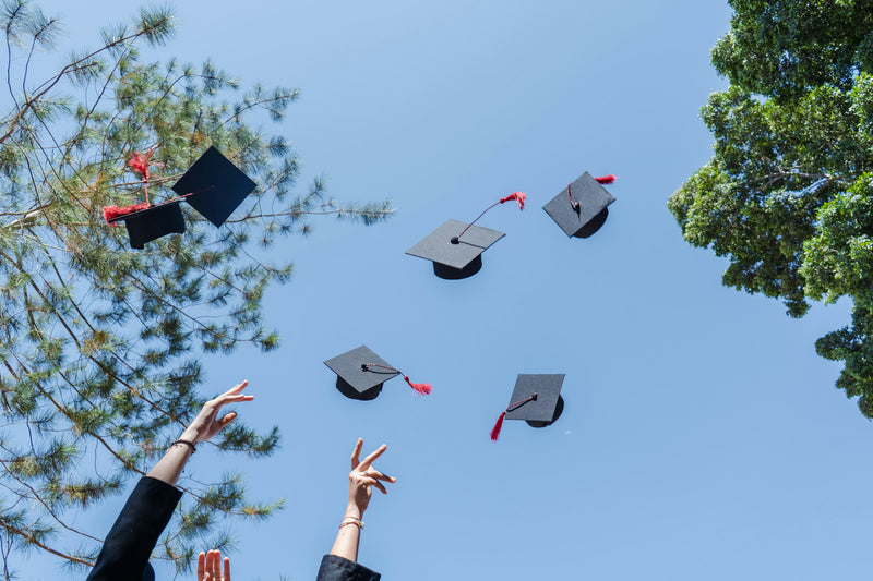 Why Do We Toss Graduation Caps in the Air?!